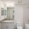 bathroom area with a sink, shelves and a stylish faucet