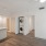 open living area connected to the kitchen and bedroom with easy accessibility to a washer dryer closet