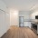 kitchen area on wooden floor with spacious room for kitchen tables or appliances
