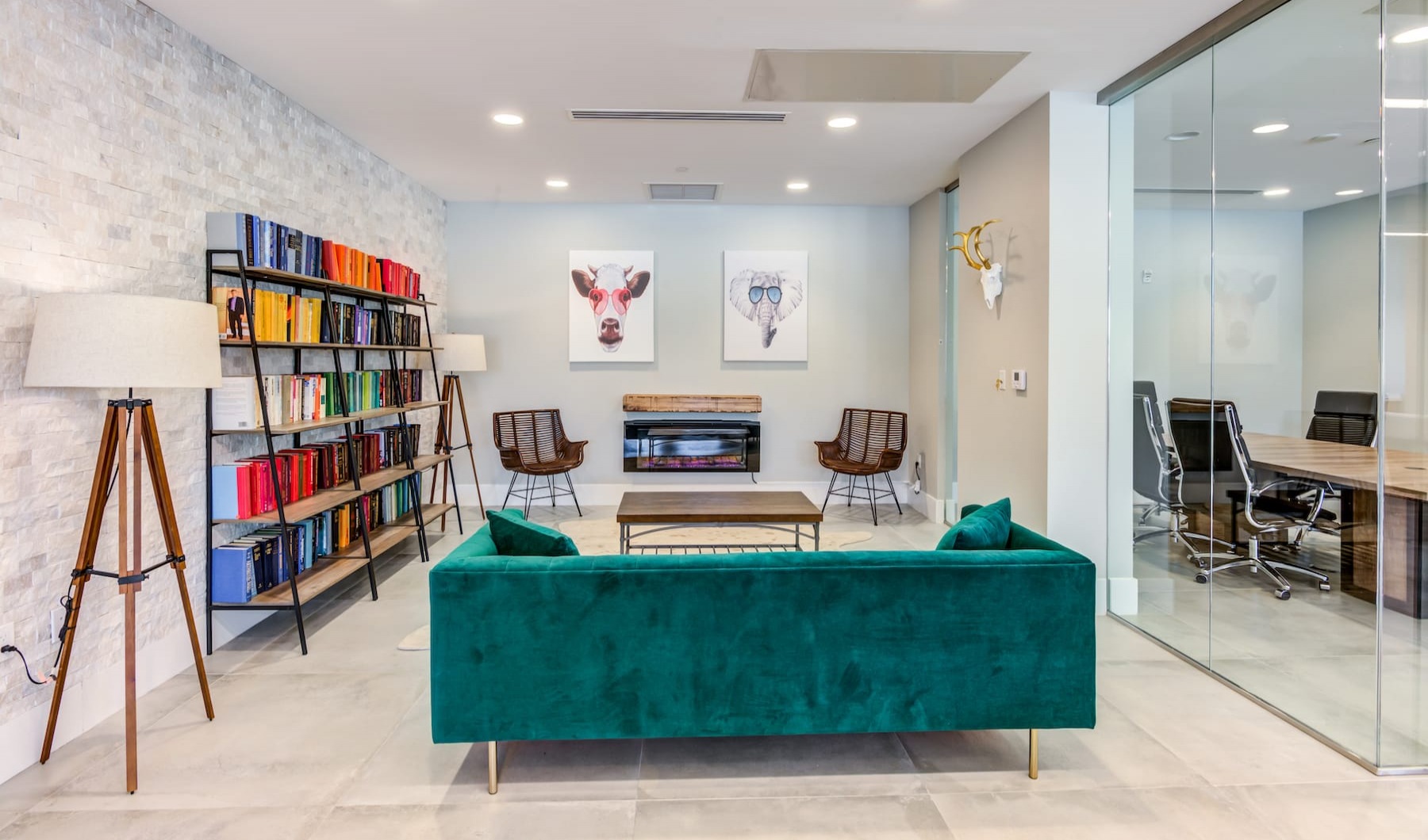 Live Different spacious clubroom with ample seating, modern decor & a fireplace