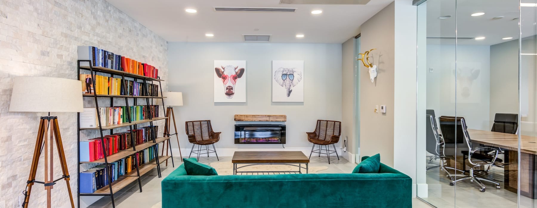 spacious clubroom with ample seating, modern decor & a fireplace