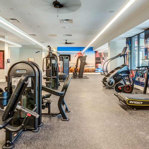 Gym spacious fitness center with equipment and large, open spaces