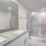 open bathroom area with a modern sink and a stylish faucet