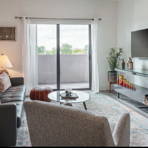 Living Room Model spacious living room with large patio doors